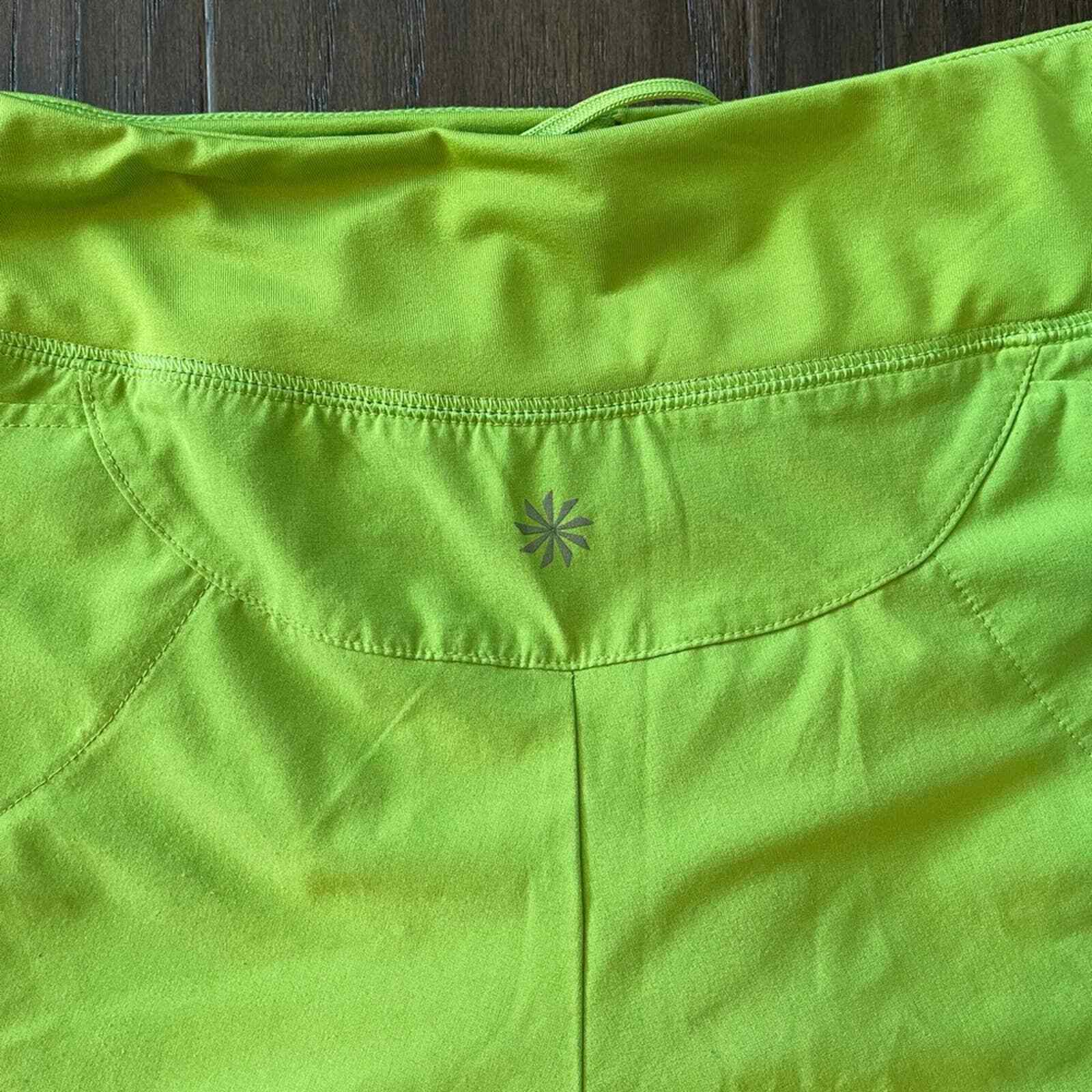 Athleta lime green running shorts Gem