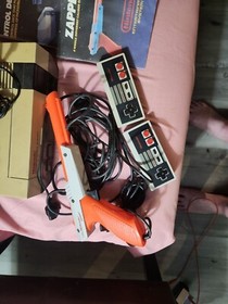 Nes With 2 Controler Zapper And 2x Games With All Books Besides 1 Game