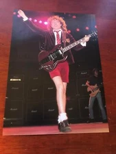 1984 VINTAGE MAGAZINE PHOTO CLIPPING WITH AC/DC ANGUS YOUNG ARM RAISED IN JACKET