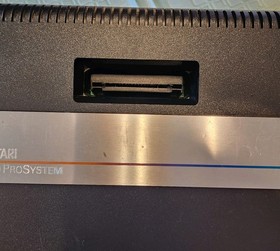 Clean Atari 7800 Console w/2 Proline Controllers, 3 games, RF Cord, & New Plug.