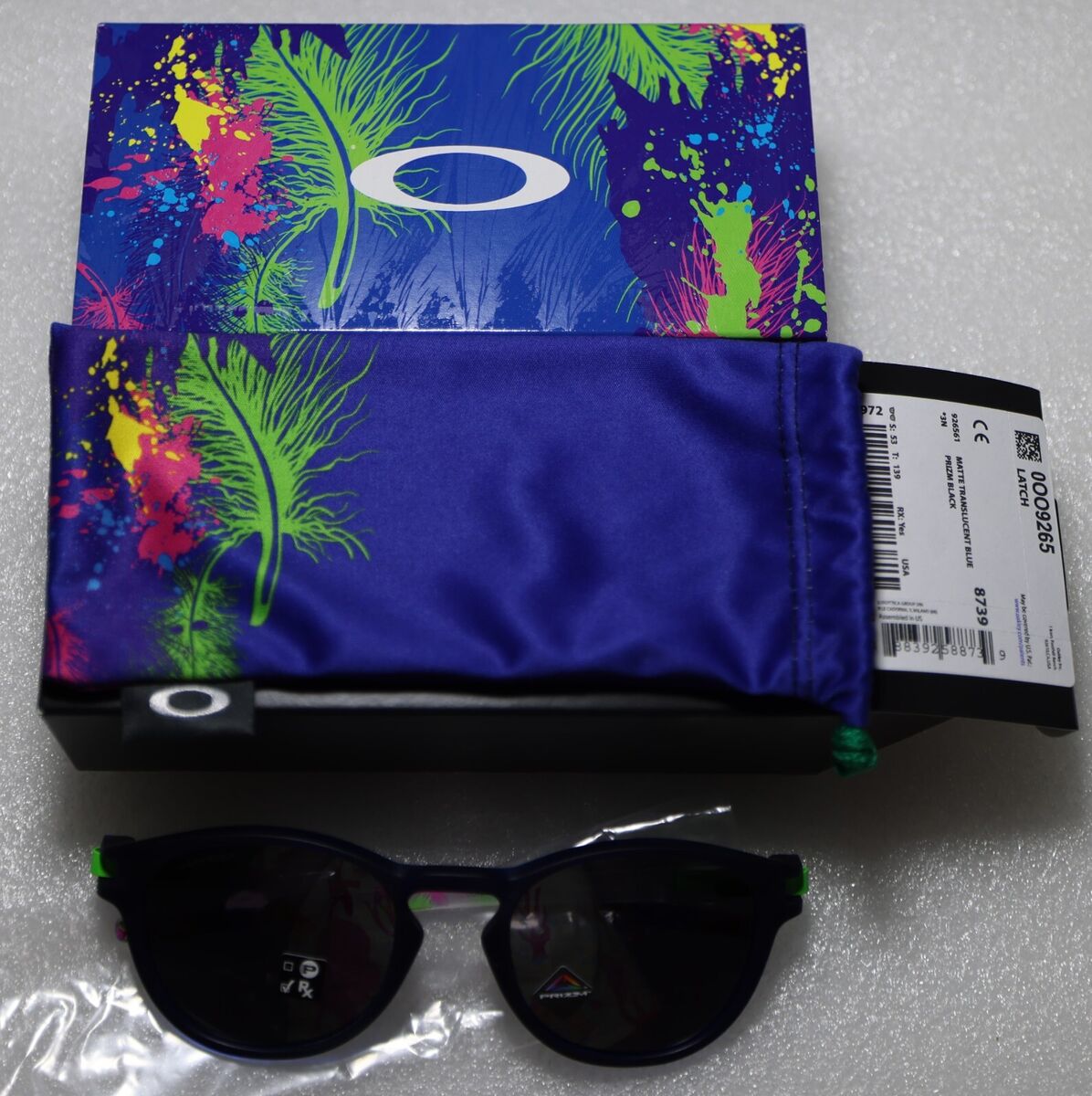 OAKLEY LATCH CARNAVAL ONLINE TRANSLUCENT BLUE PRIZM BLACK OAKLEY LATCH CARNAVAL ONLINE TRANSLUCENT BLUE PRIZM BLACK