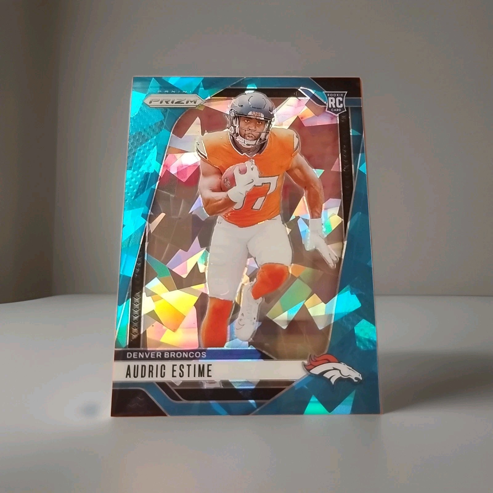 2024 Panini Prizm - Rookies Audric Estime #306 Blue Ice Prizm /99 (RC)