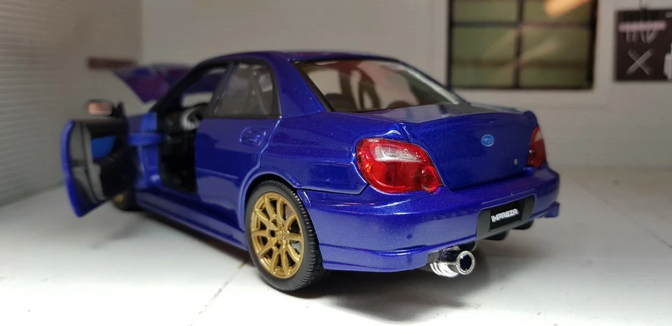 Subaru Impreza WRX STi Hawkeye Blue 2006 GD Welly 1:24 Scale Diecast Model Car - Image 4 of 4