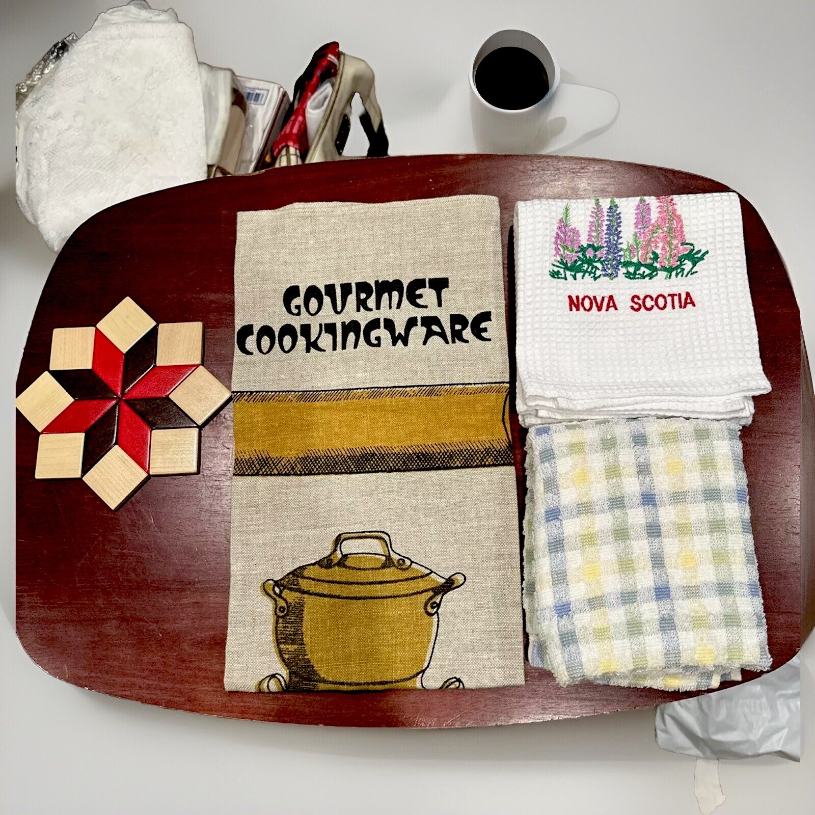 4 Piece Kitchen Set (2) Cotton Towels (1) Linen Towel (1) Wooden Hot Pad