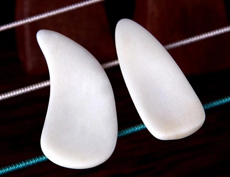 8X Buffalo Skeleton Carved Gu Zheng String Finger Picks Adult Nails - Image 2 of 3