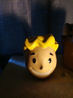 Set Of 2 Fallout Coffee Mugs Condition Is Pretty Good,Pip Boy Mug And Vault Boy