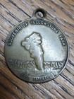 Vintage Brass Key Chain Lucky Coin Yellowstone Park Old Faithful — photo 1