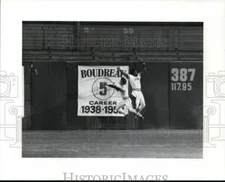 Press Photo: Cleveland Indians outfielders jump to catch fly ball - cvb50724