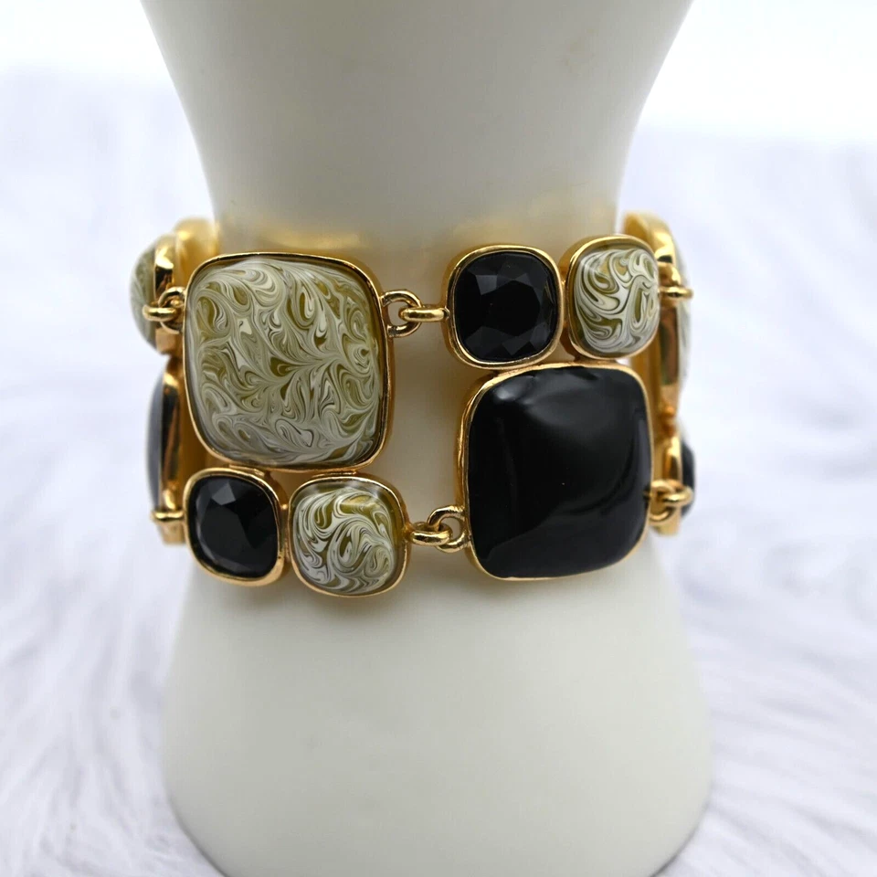 Brazalete Kate Spade NY Ancho Negro Cristal Esmalte Tostado Remolino 7 1/2" Tono Dorado Foto 3 de 4