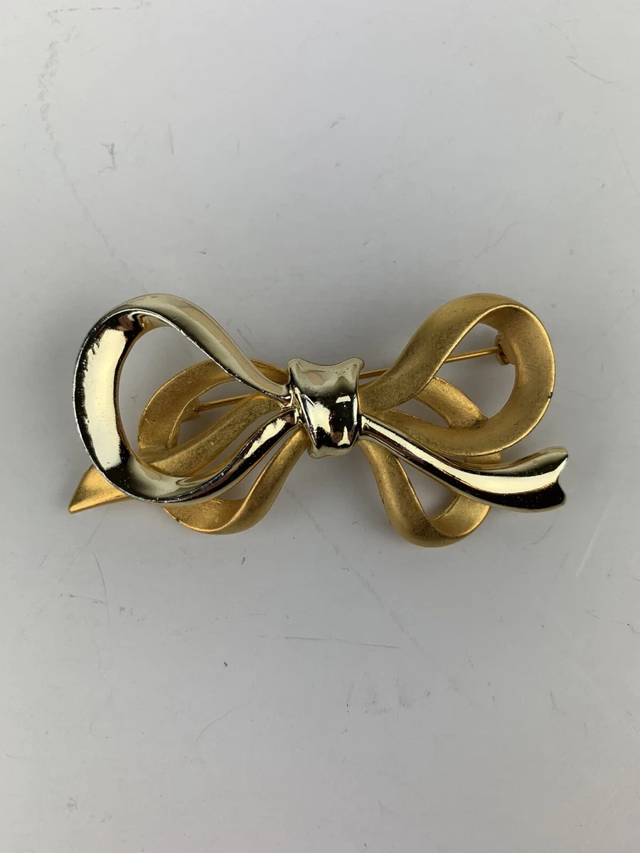 Bow brooch pin deals