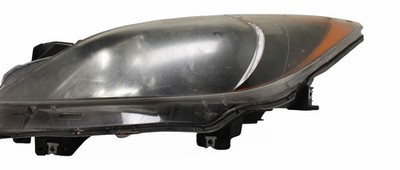 Used Left Headlight Assembly fits: 2010 Mazda 3 halogen chrome projector bezel L