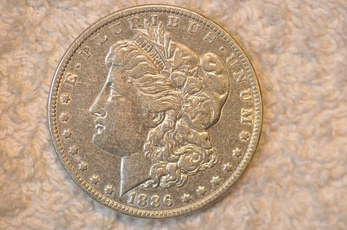 1886-O.  AU MORGAN DOLLAR.  #2