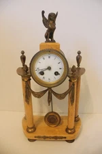 pendule de table XIX ème en marbre et bronze avec sphynx