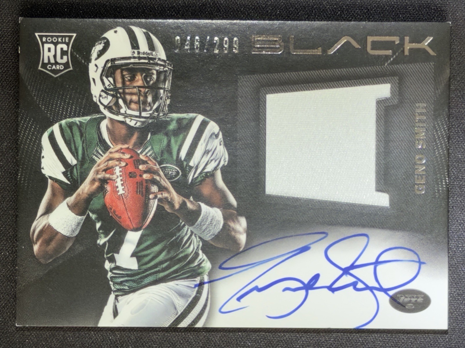 2013 Panini Black - Rookie Signatures Materials Prime Geno Smith #211 /299 (RC)