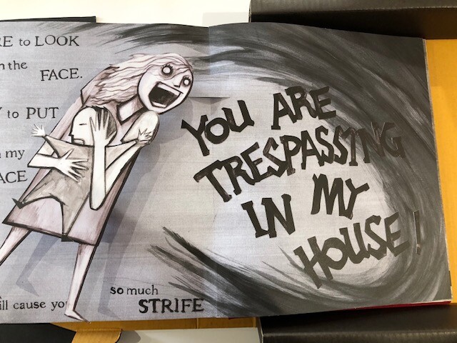 An open book with the title 'Babadook Book Quotes' and a shadowy figure in the background