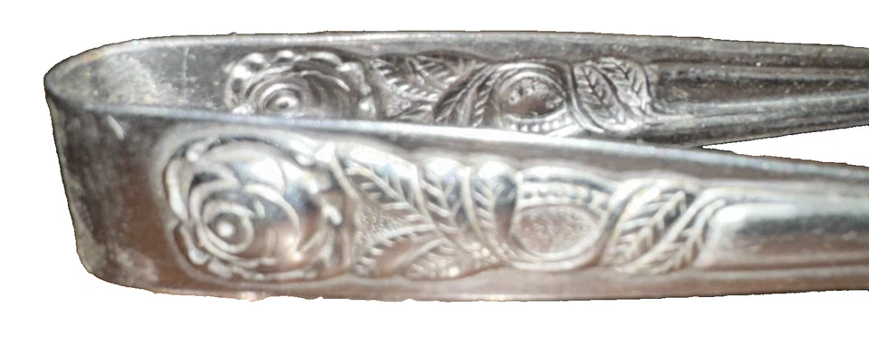 Pinzas de azúcar vintage con mango de rosa plateada Foto 2 de 4