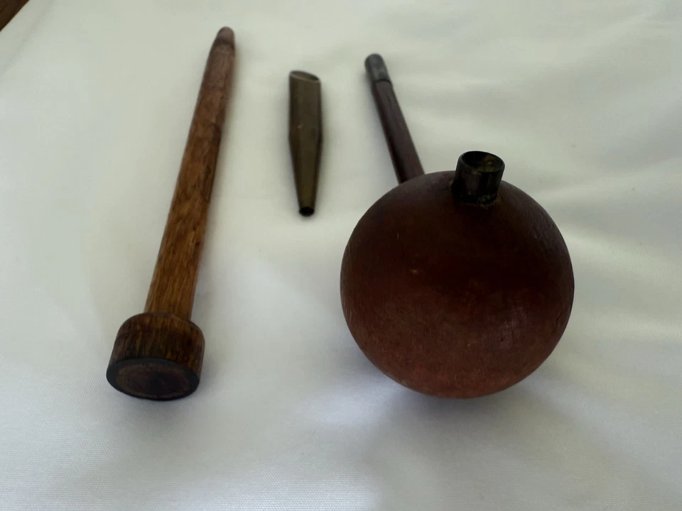 Arrancador de bola de polvo negro Foto 3 de 3