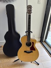 Taylor electro acoustic Guitar Model 214ce DLX, mint condition.