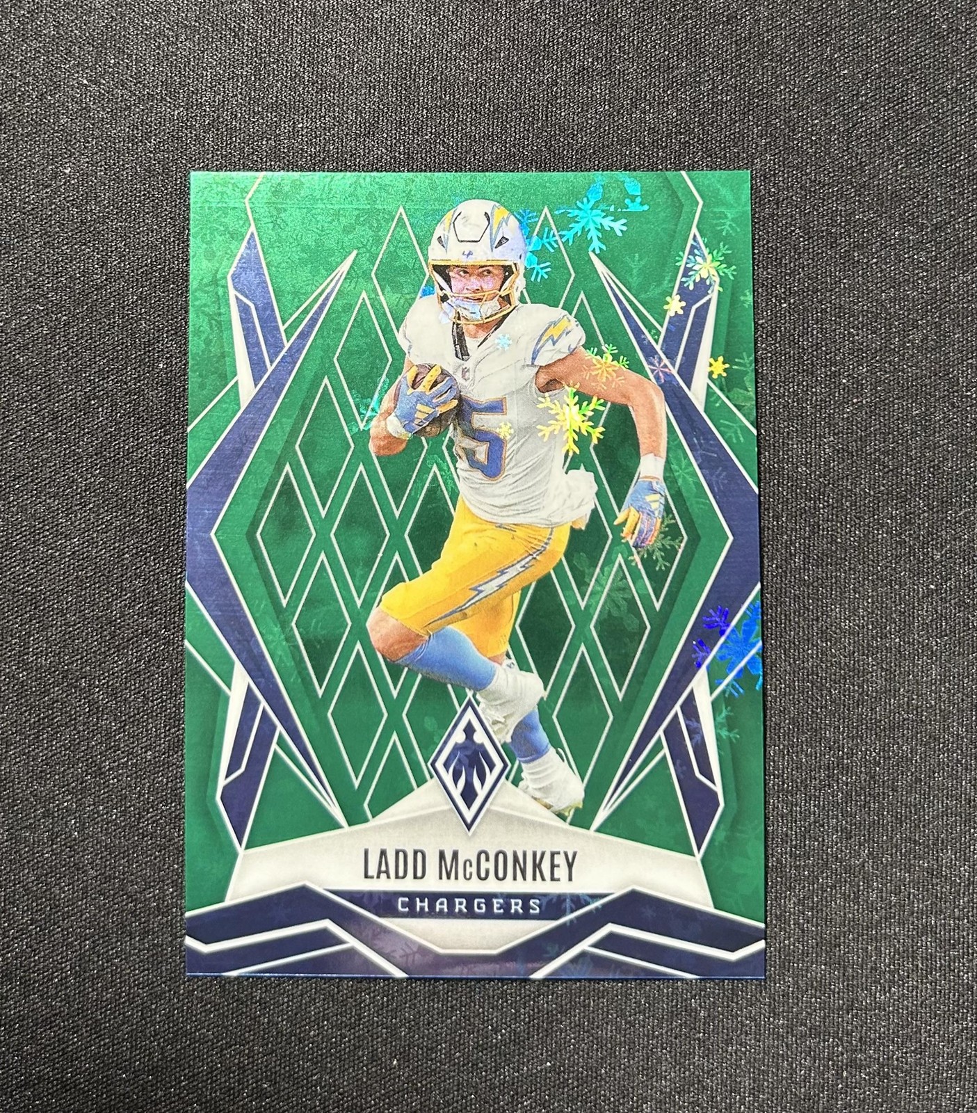 2025 Panini Phoenix #66 Ladd McConkey Green Winter Prizm #/149
