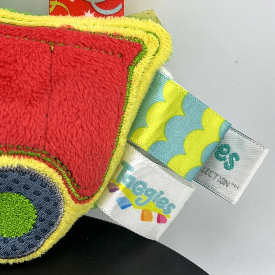 Детская игрушка погремушка 5 дюймов полицейский автомобиль самосвал Taggies Wheelies Mary Meyer - Изображение 2 из 4