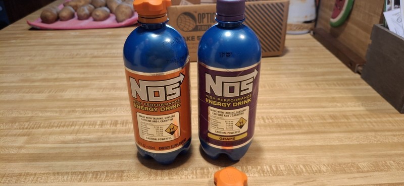 NOS GRAPE & REGULAR HIGH PERFORMANCE ENERGY DRINK 22 OZ. BOTTLES EMPTY...Qty 2.