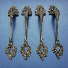 4 MANIGLIE ANTICHE IN OTTONE