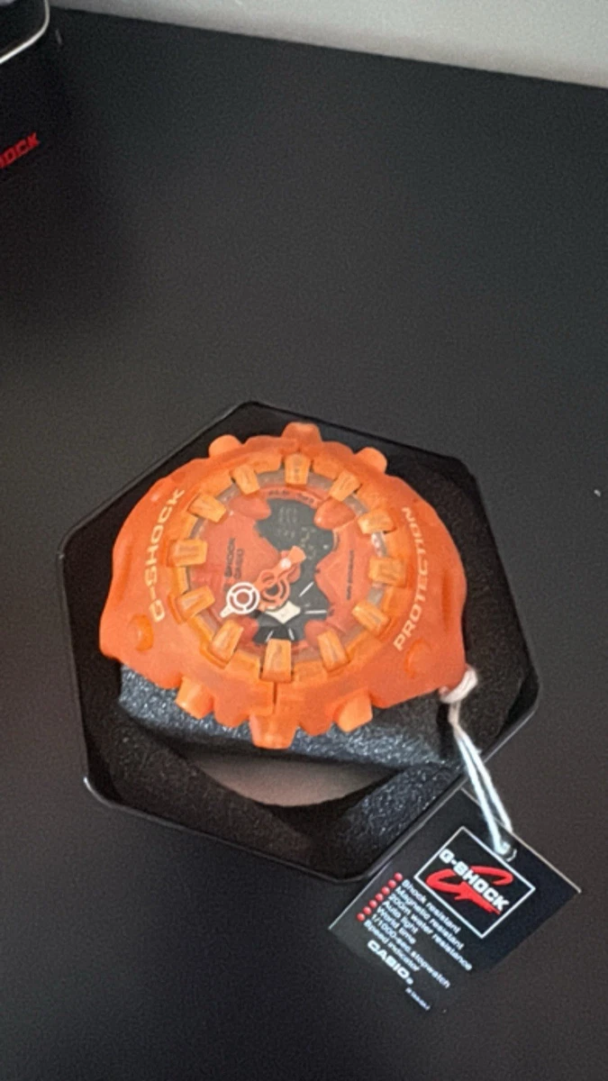 Reloj digital analógico Casio G-Shock naranja - caja y etiqueta de hojalata negra