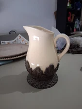 GG COLLECTION Small Cream Colored Pitcher With Metal Base