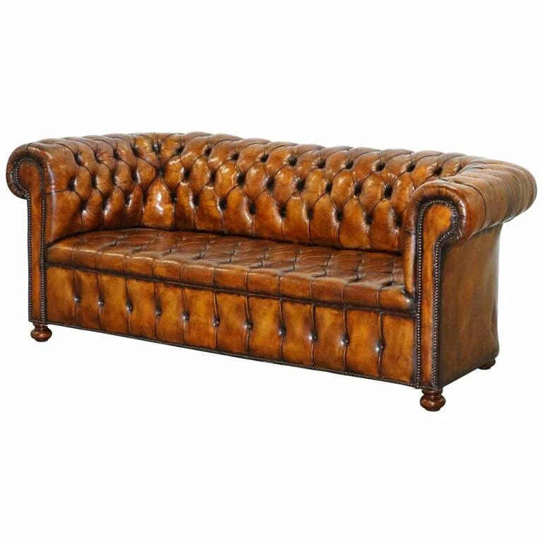 RARE CIRCA 1900 HAND DYED FULLY RESTORED WHISKY BROWN LEATHER CHESTERFIELD SOFA
Opens in a new windo