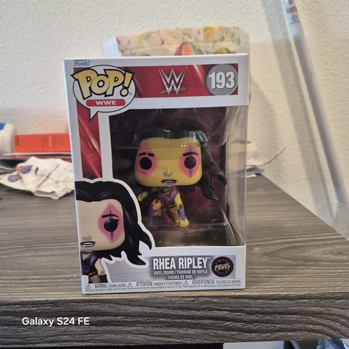 Funko Pop Wwe Rhea Ripley #193 Blacklight Chase In Hand