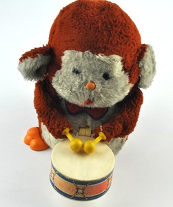 monkey toy playing drums