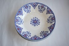 Plat creux ancien en faïence