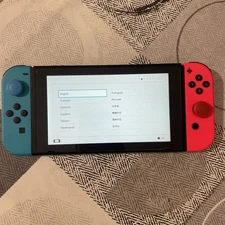 Nintendo Switch 32GB Handheld Console - Neon Red/Neon Blue COME NUOVO