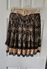 Almost Famous skirt with black lace & gold satin underskirt. Size 10. Immaculate