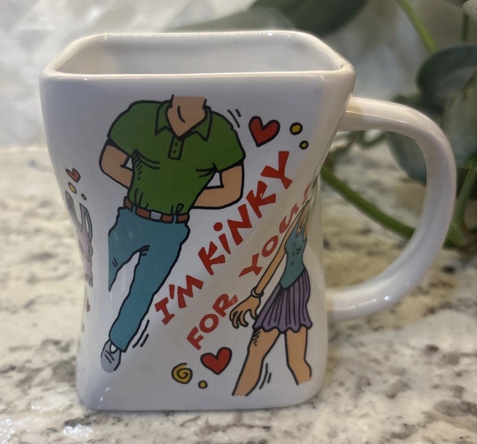 A genuinely vintage Dankin novelty mug with cheeky wordplay that hits different as an actual relic from a pre-internet era of gift shop humor.