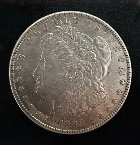 Morgan Dollar - 1886 - Sharp and Ch XF/AU
