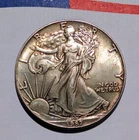 1987 American Eagle, Type 1, 1oz .999 Silver, w/ Natural Toning, reverse residue
