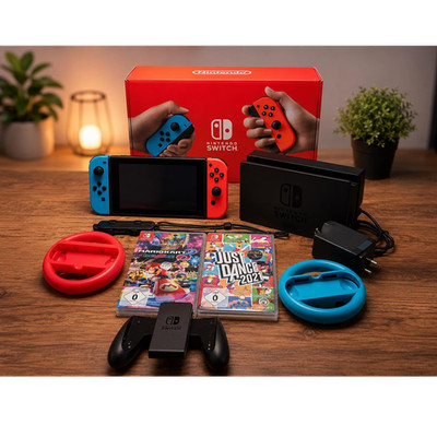 Nintendo Switch mit Mario Kart 8 Deluxe, Just Dance 2021, Joy-Con, ...