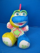 Vintage 1991 Fisher Price Puffalump Plush Dinosaur Baby Blue Yellow Rattle Eyes