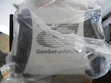 Gamber-Johnson Notepad V Laptop Docking Station with key and parts pictured