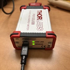 Thorlabs PM100USB Power Meter. New, Open box with all other items on it.