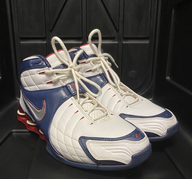 white and blue nike shox