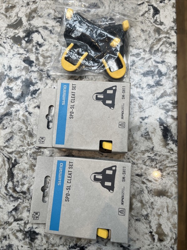 3 sets of Shimano SPD SL Cleats to sell - Yellow - £5 each or £12 the lot
