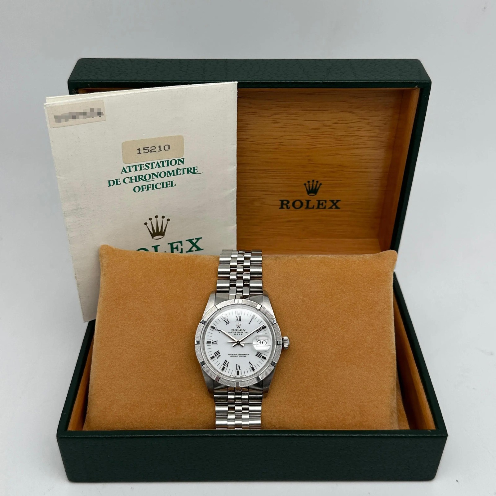 Rolex Date 15210 34mm Engine Turned Steel White Dial Automatic Unisex Watch