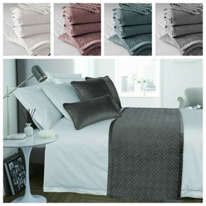teal bed runner and cushions