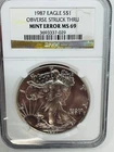 1987 American .999 Silver Eagle Minor Obverse Struck Thru Error NGC MS69 Coin