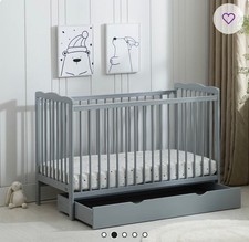 Brand new cot bed with matress and drawer