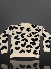 SHEIN Kids Sweater Size M, Color beige with black pattern.