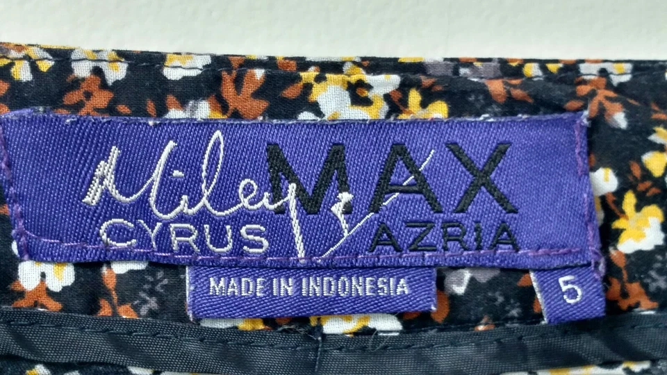 PANTALONES CORTOS MILY CYRUS MAX AZRIA talla 5 negros con flores amarillas y blancas marrón   Foto 2 de 4