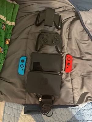 Nintendo Switch   OLED Model w/ Red & Blue Joy-Con w/ Dock and Pro Controller